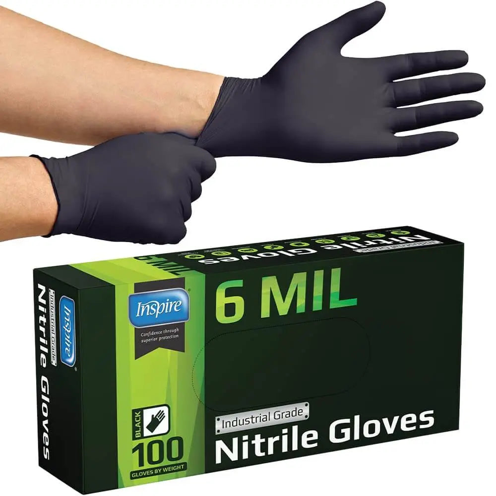 Inspire black nitrile gloves box of 100, 6 mil thick, disposable for medical and industrial use with hands showing gloves.