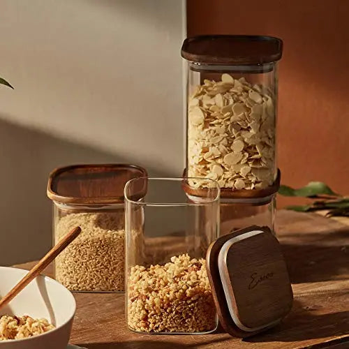 https://modernspacegallery.com/cdn/shop/products/Essos-Square-Glass-Jars-with-Wooden-Lids---Set-of-_2_-52-fl-oz-Airtight-and-Stackable-Storage-Containers-Essos-1661747284.jpg?v=1661747285&width=1445