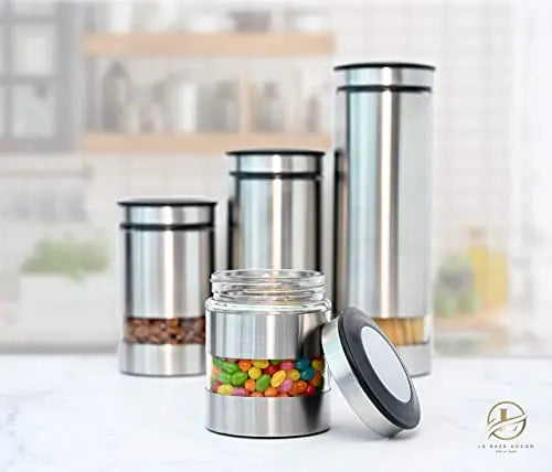 https://modernspacegallery.com/cdn/shop/products/Le-raze-Airtight-Food-Storage-Container-for-Kitchen-Counter-with-Window_-_Set-of-4_-Canister-Set-Ideal-for-Flour-Tea_-Sugar_-Coffee_-Candy_-Cookie-Jar-Le-raze-1667081415.jpg?v=1667081417&width=1445