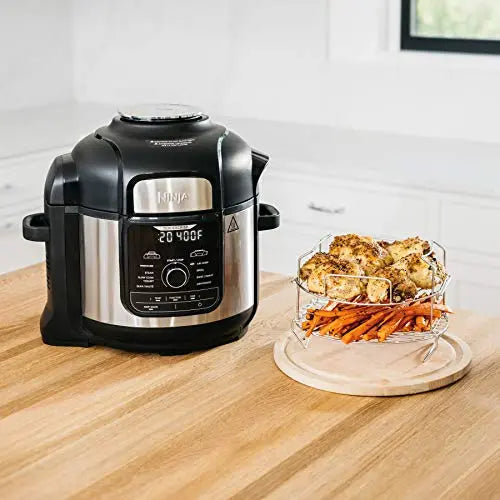 https://modernspacegallery.com/cdn/shop/products/Ninja-Foodi-Pressure-Cooker-9-in-1-Deluxe-Extra-Large-8-QT-Air-Fry---Stainless-Finish-Ninja-1661767819.jpg?v=1661767820&width=1445